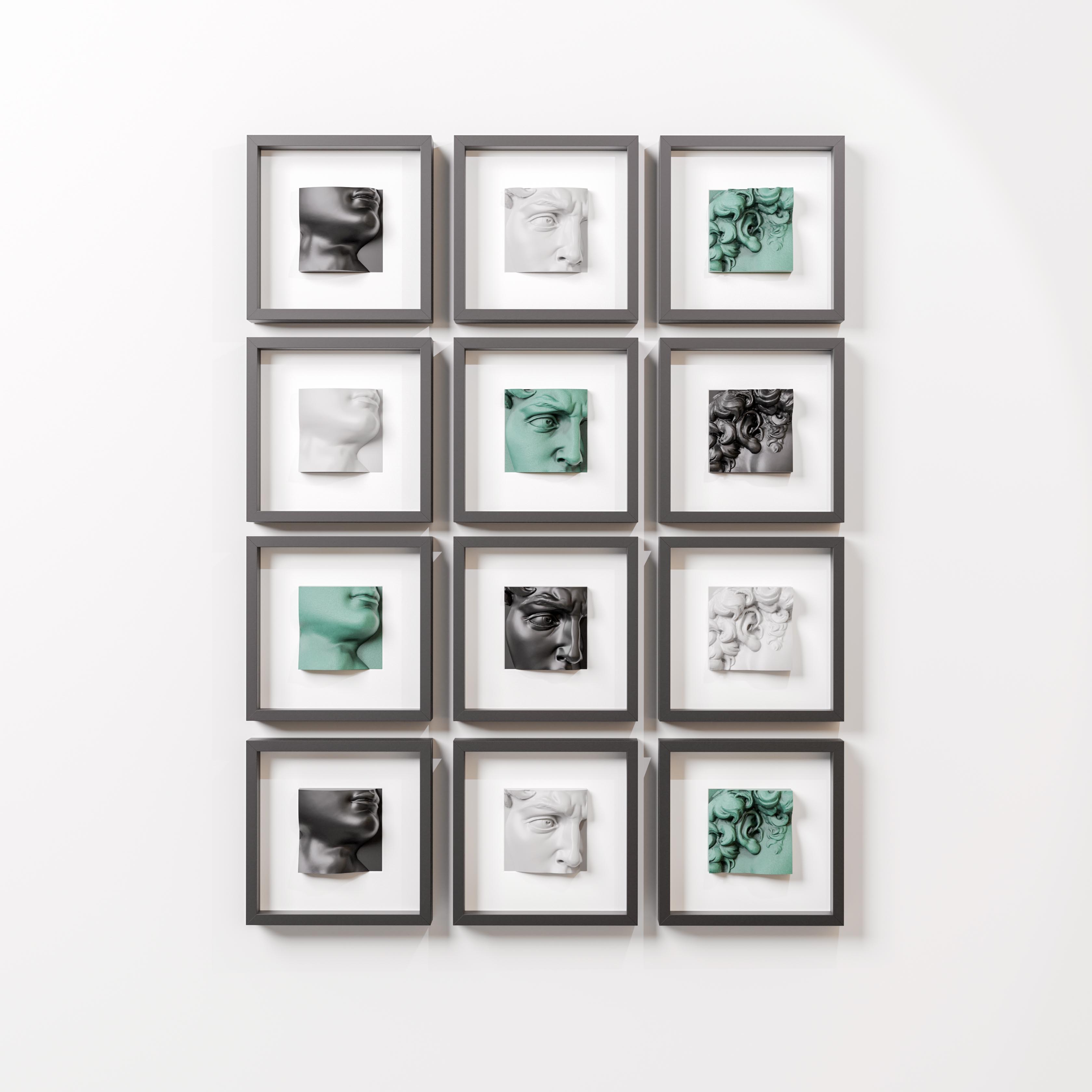 A grid of twelve modern sculptures displayed in individual black shadowbox frames, arranged in three rows of four. Each frame contains a three-dimensional fragment of classical-style faces and features, crafted in a mix of white, black, and soft green hues. The sculptures showcase intricate facial details, including eyes, lips, and ears, blending a contemporary aesthetic with classical influences against a minimalist white wall.