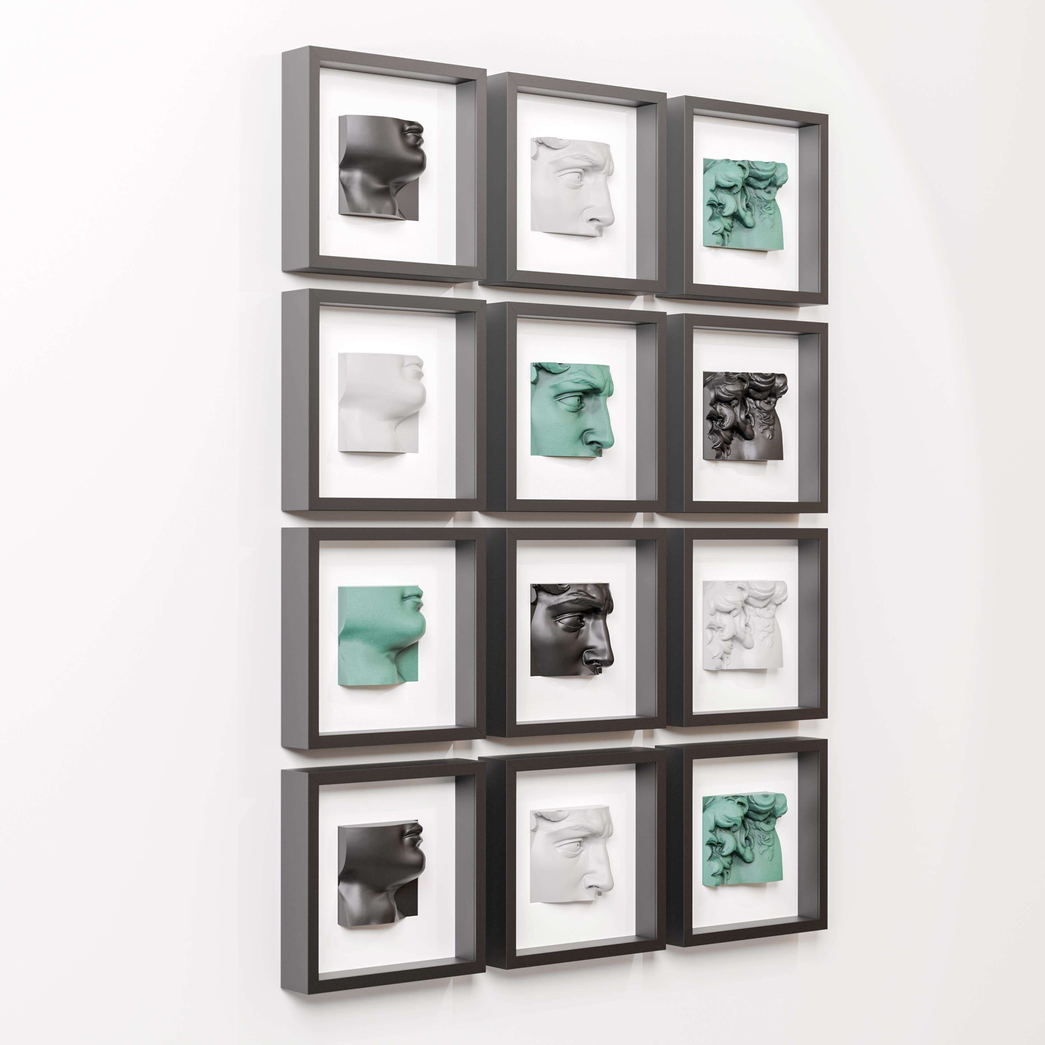 A grid of twelve modern sculptures displayed in individual black shadowbox frames, arranged in three rows of four. Each frame contains a three-dimensional fragment of classical-style faces and features, crafted in a mix of white, black, and soft green hues. The sculptures showcase intricate facial details, including eyes, lips, and ears, blending a contemporary aesthetic with classical influences against a minimalist white wall.