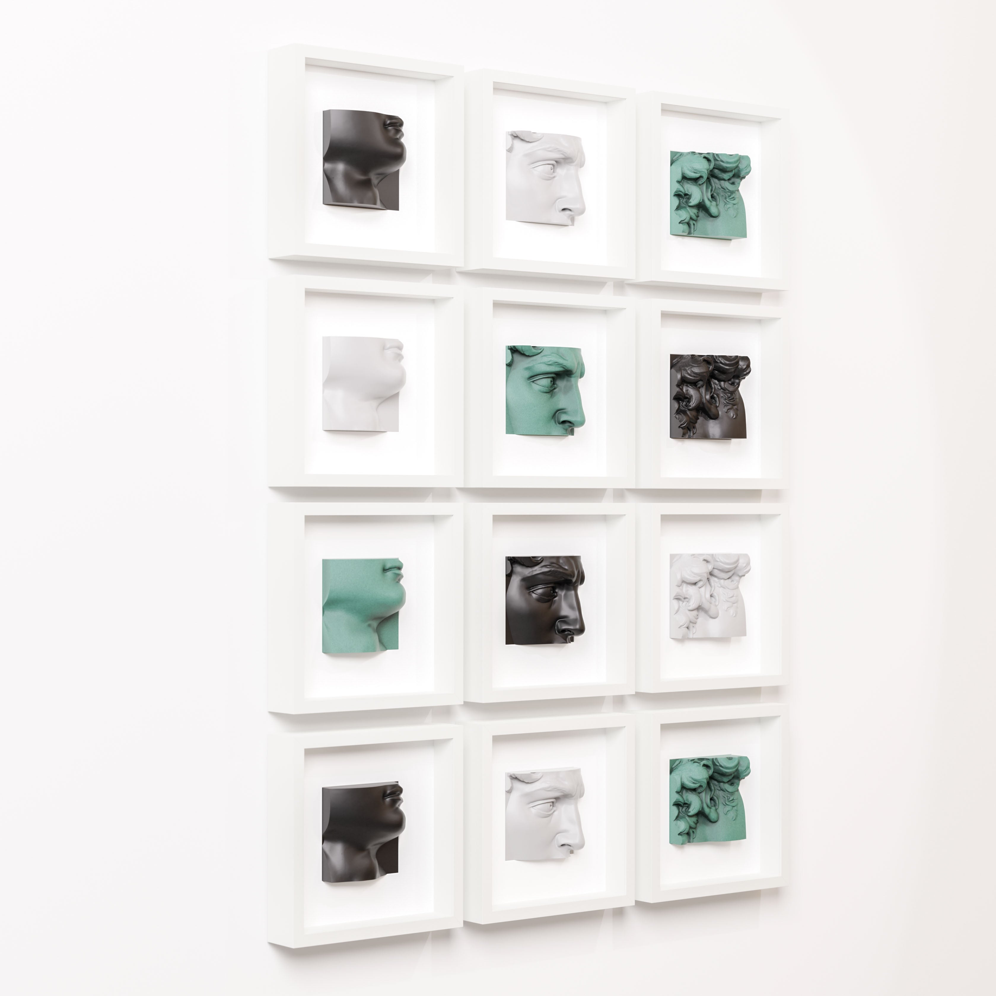 A grid of twelve modern sculptures displayed in individual white shadowbox frames, arranged in three rows of four. Each frame contains a three-dimensional fragment of classical-style faces and features, crafted in varying colors including white, black, and soft green. The sculptures emphasize intricate facial details, such as eyes, lips, and ears, blending contemporary and classical art styles against a clean, white wall.