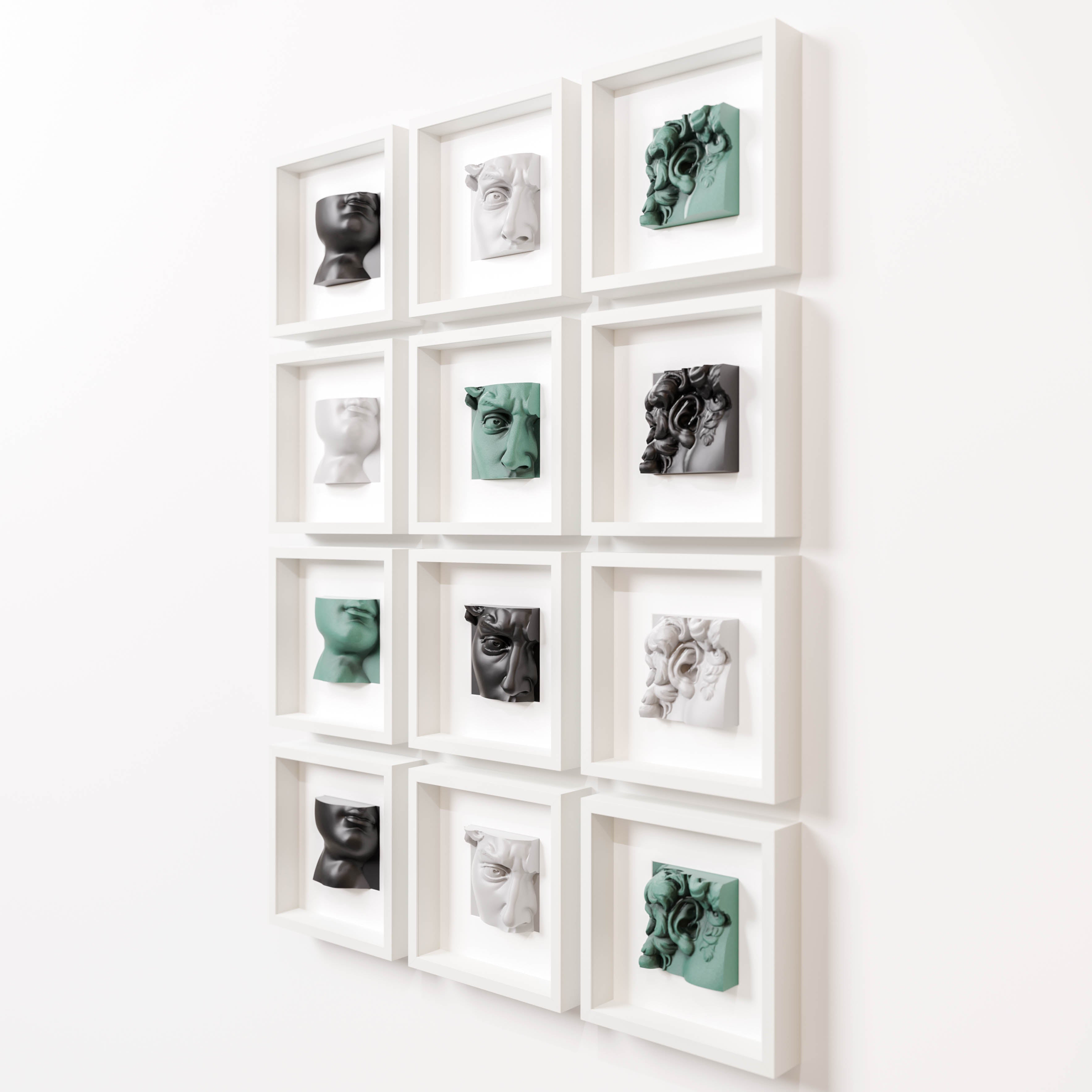 A grid of twelve modern sculptures displayed in individual white shadowbox frames, arranged in three rows of four. Each frame contains a three-dimensional fragment of classical-style faces and features, crafted in varying colors including white, black, and soft green. The sculptures emphasize intricate facial details, such as eyes, lips, and ears, blending contemporary and classical art styles against a clean, white wall.