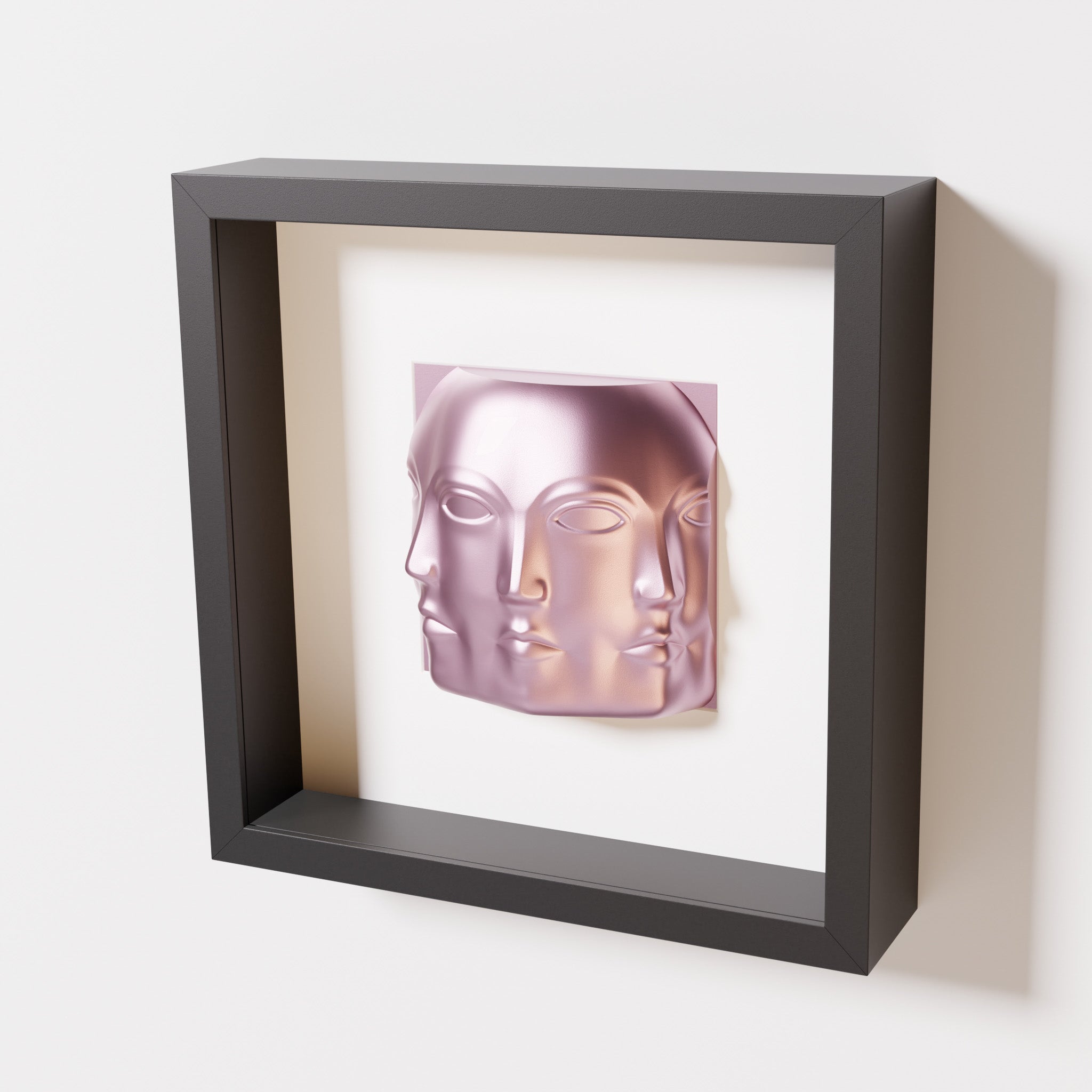 A close-up of a black shadowbox frame containing a metallic rose sculpture of 'Dora,' featuring three interconnected faces merging at the edges, creating a surreal and multi-dimensional effect.