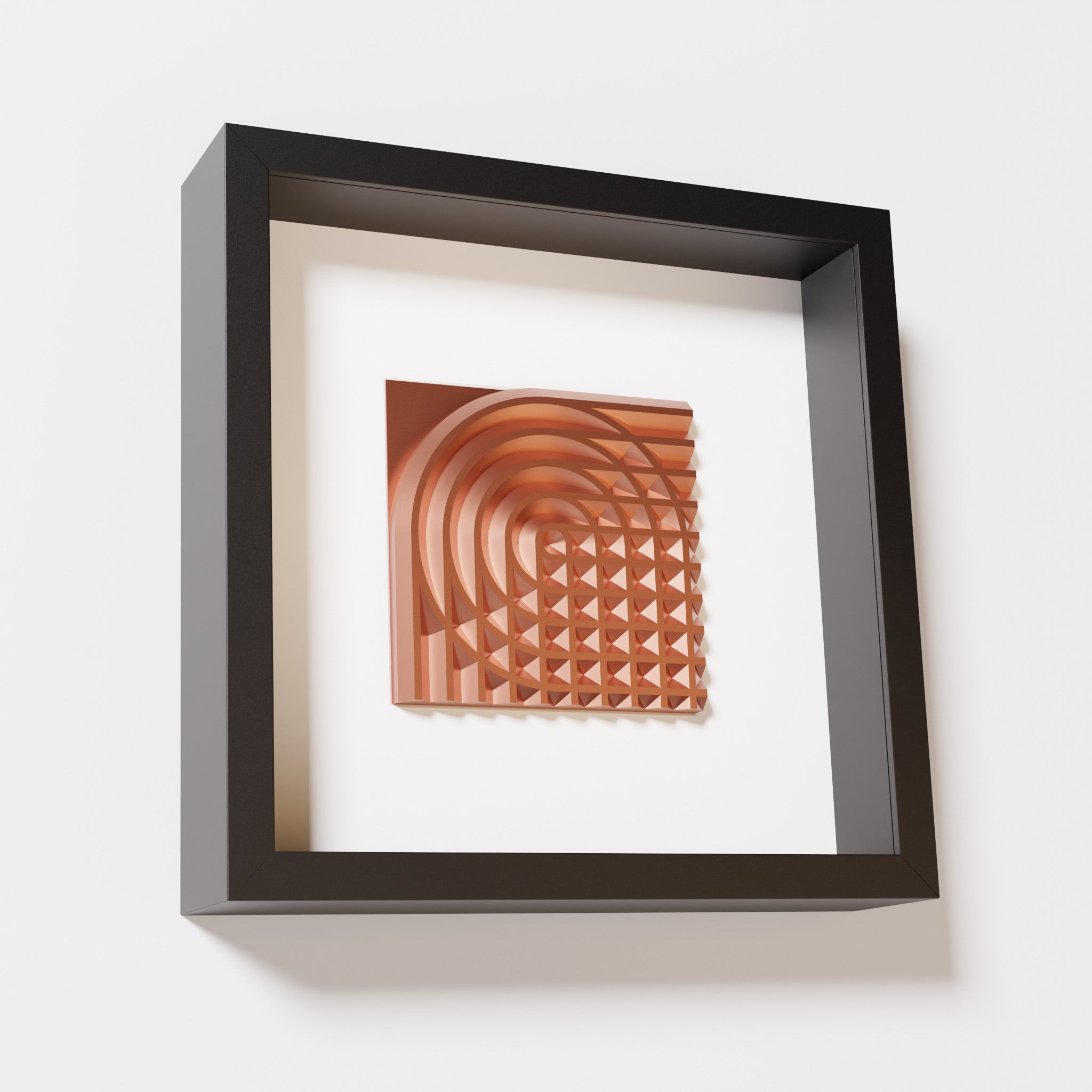 A close-up of a black shadowbox frame containing a chrome copper artwork featuring the elegant arcs and geometric grid of 'Rainbow II,' showcasing reflective copper highlights.