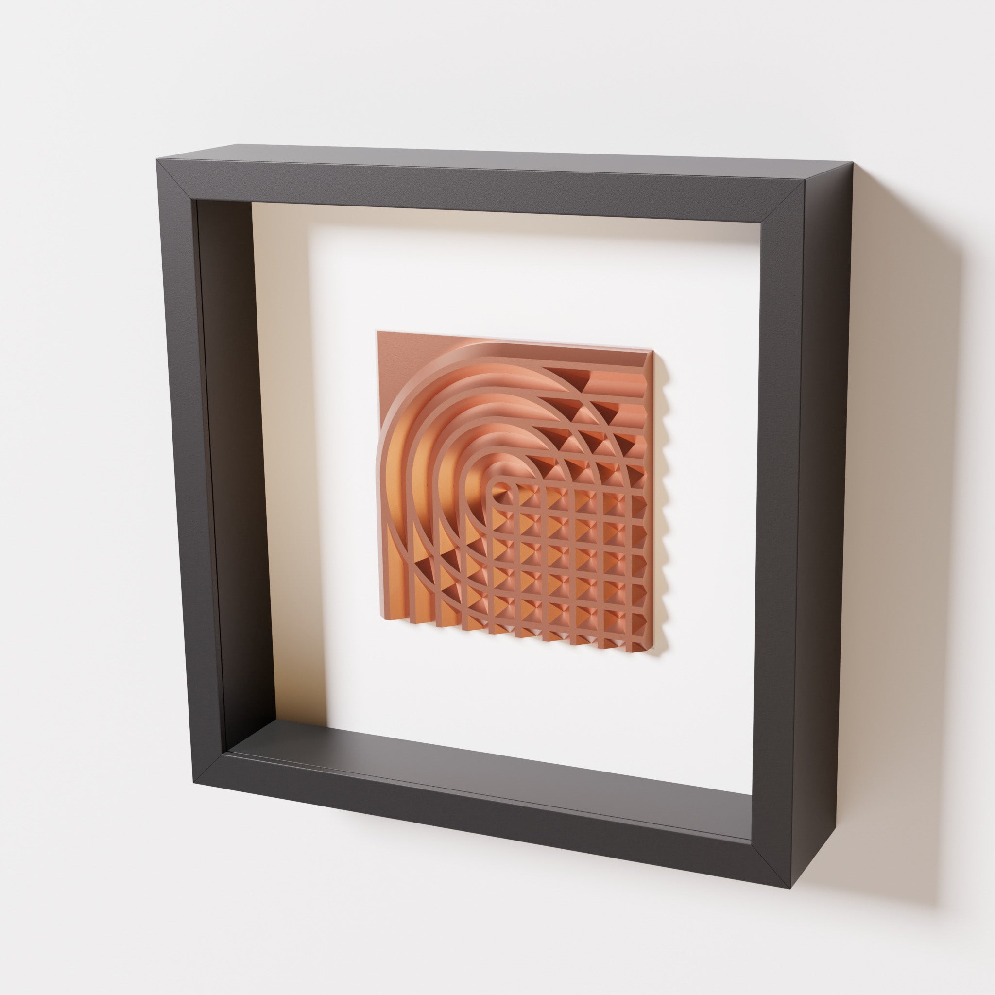 A close-up of a black shadowbox frame containing a chrome copper artwork featuring the elegant arcs and geometric grid of 'Rainbow II,' showcasing reflective copper highlights.