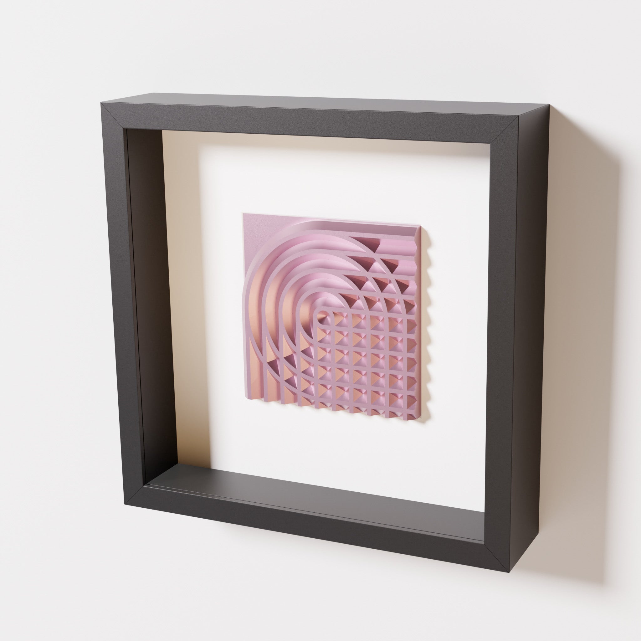 A close-up of a black shadowbox frame containing a metallic rose artwork featuring the elegant arcs and geometric grid of 'Rainbow II,' showcasing reflective pink highlights.