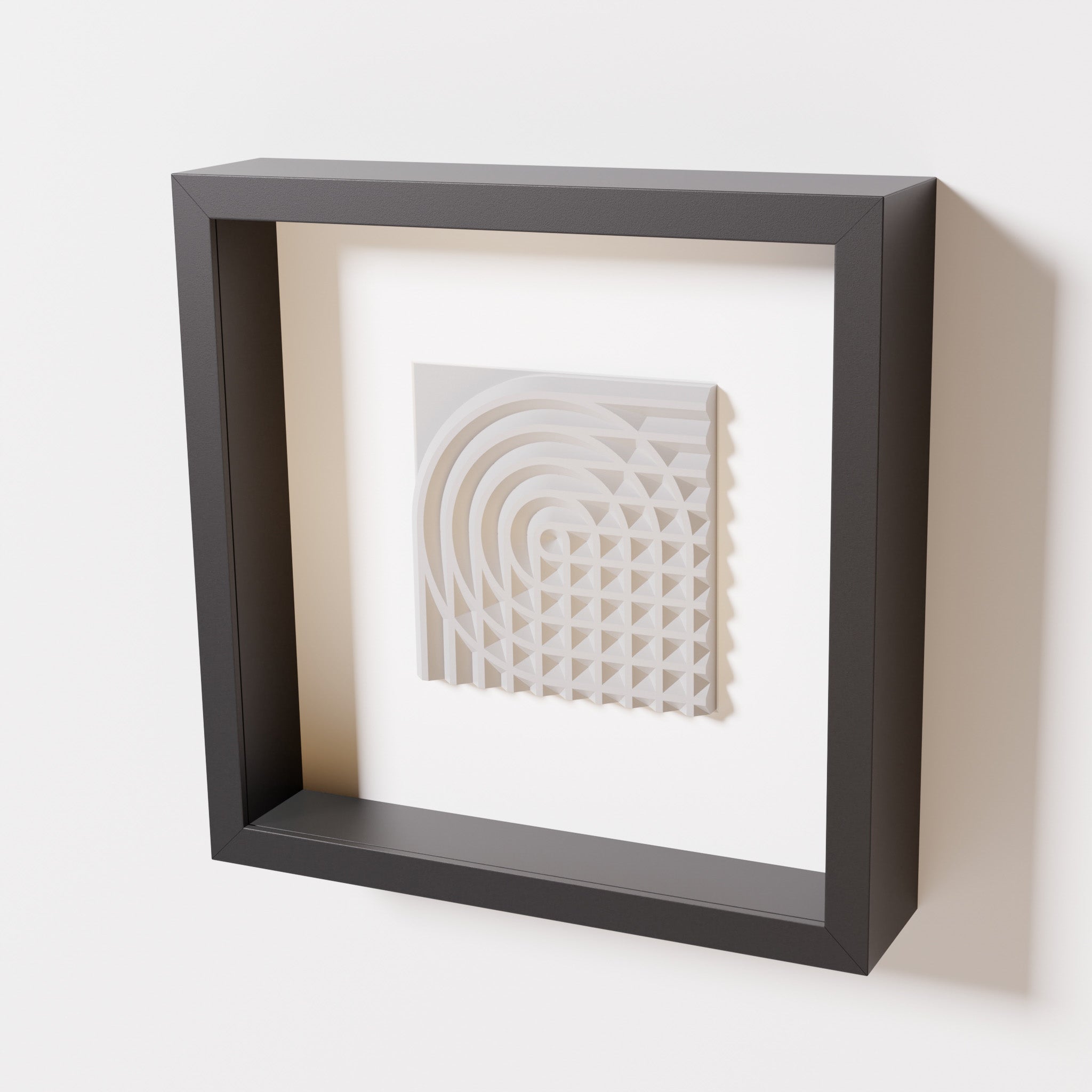 A close-up of a black shadowbox frame containing a marble white artwork featuring the elegant arcs and geometric grid of 'Rainbow II,' showcasing a smooth and refined texture.