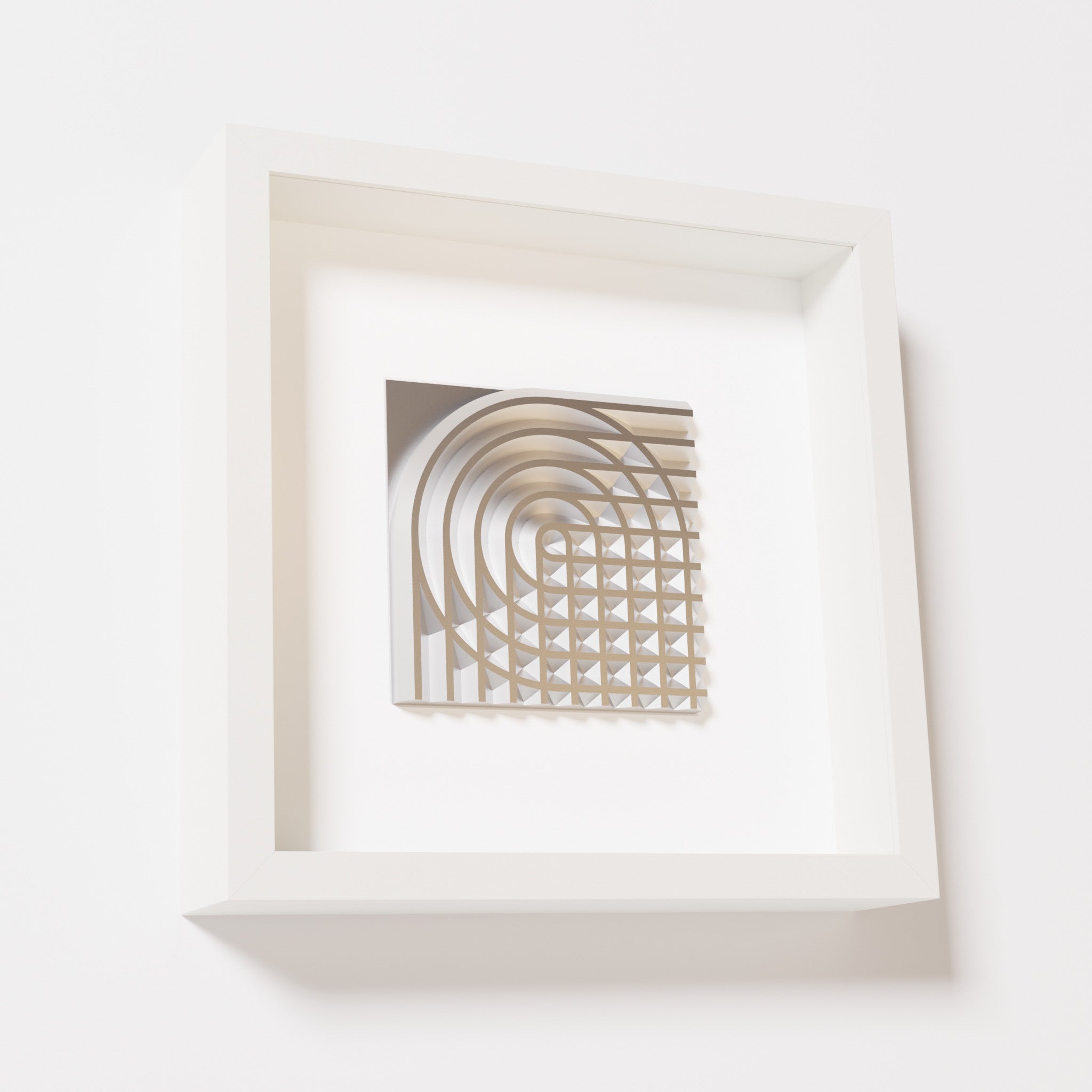 A close-up of a white shadowbox frame containing a chrome silver artwork featuring the elegant arcs and geometric grid of 'Rainbow II,' showcasing reflective silver highlights.