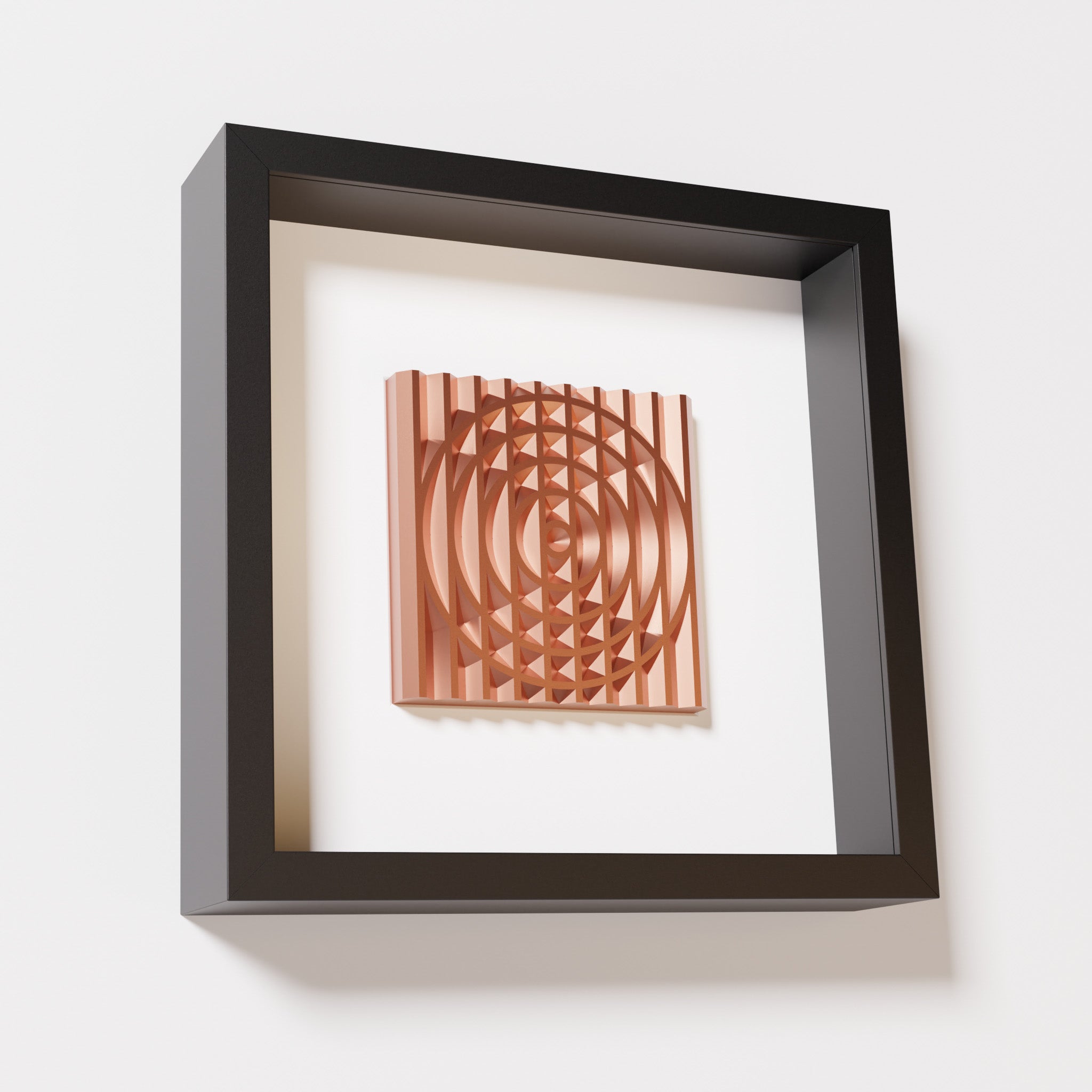 A close-up of a black shadowbox frame containing a chrome copper artwork featuring the elegant arcs and geometric grid of 'Rainbow III,' showcasing reflective copper highlights.