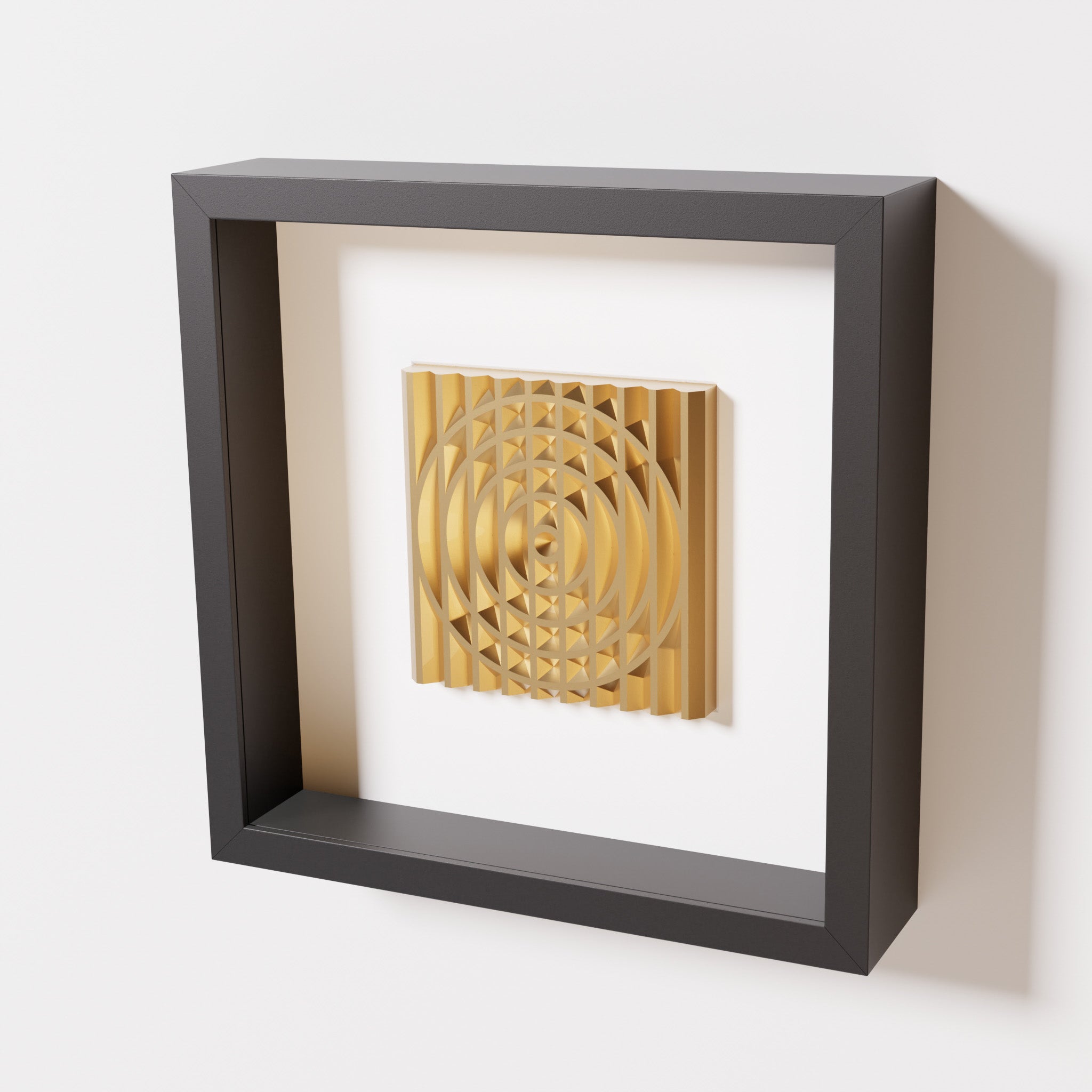 A close-up of a black shadowbox frame containing a chrome gold artwork featuring the elegant arcs and geometric grid of 'Rainbow III,' showcasing reflective golden highlights.