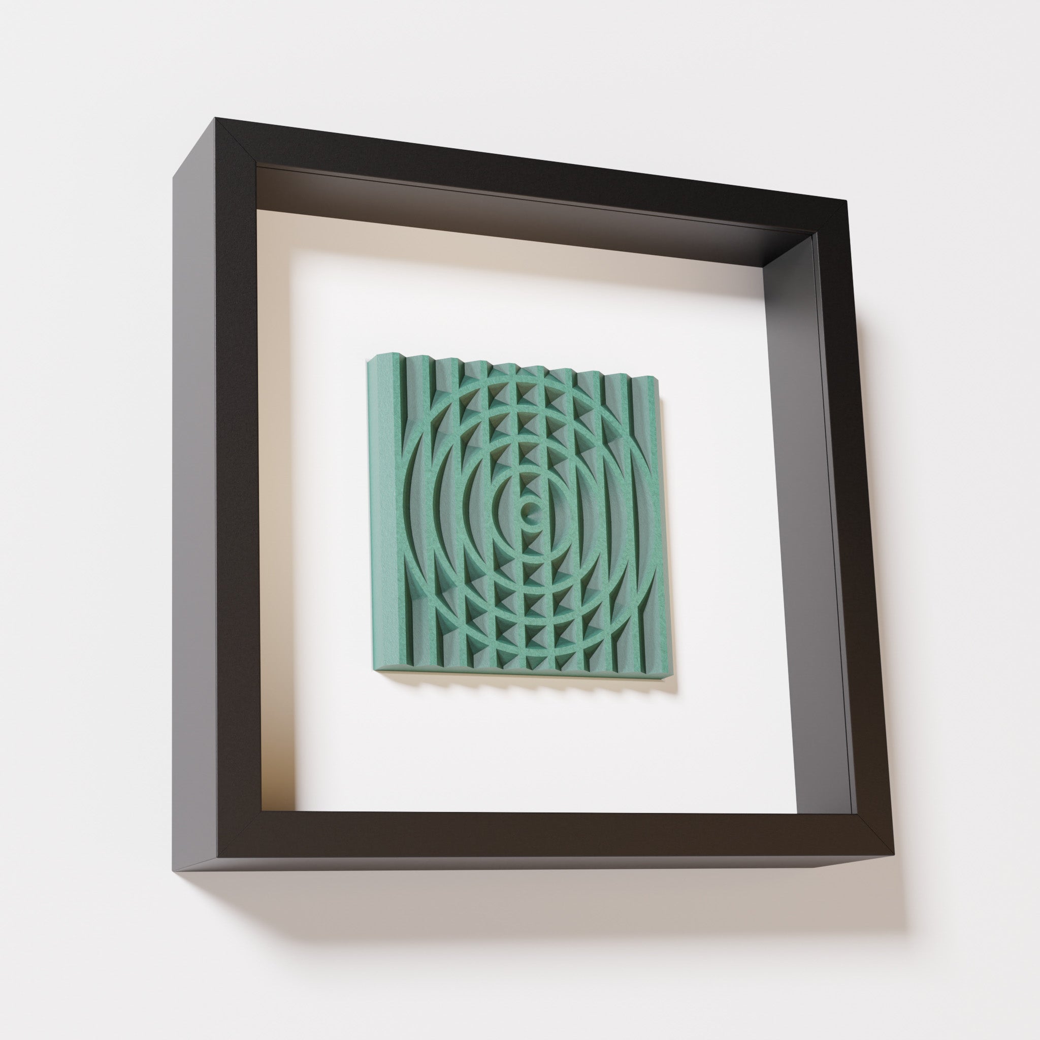 A close-up of a black shadowbox frame containing an old patina artwork featuring the elegant arcs and geometric grid of 'Rainbow III,' showcasing a textured green finish and intricate detail.