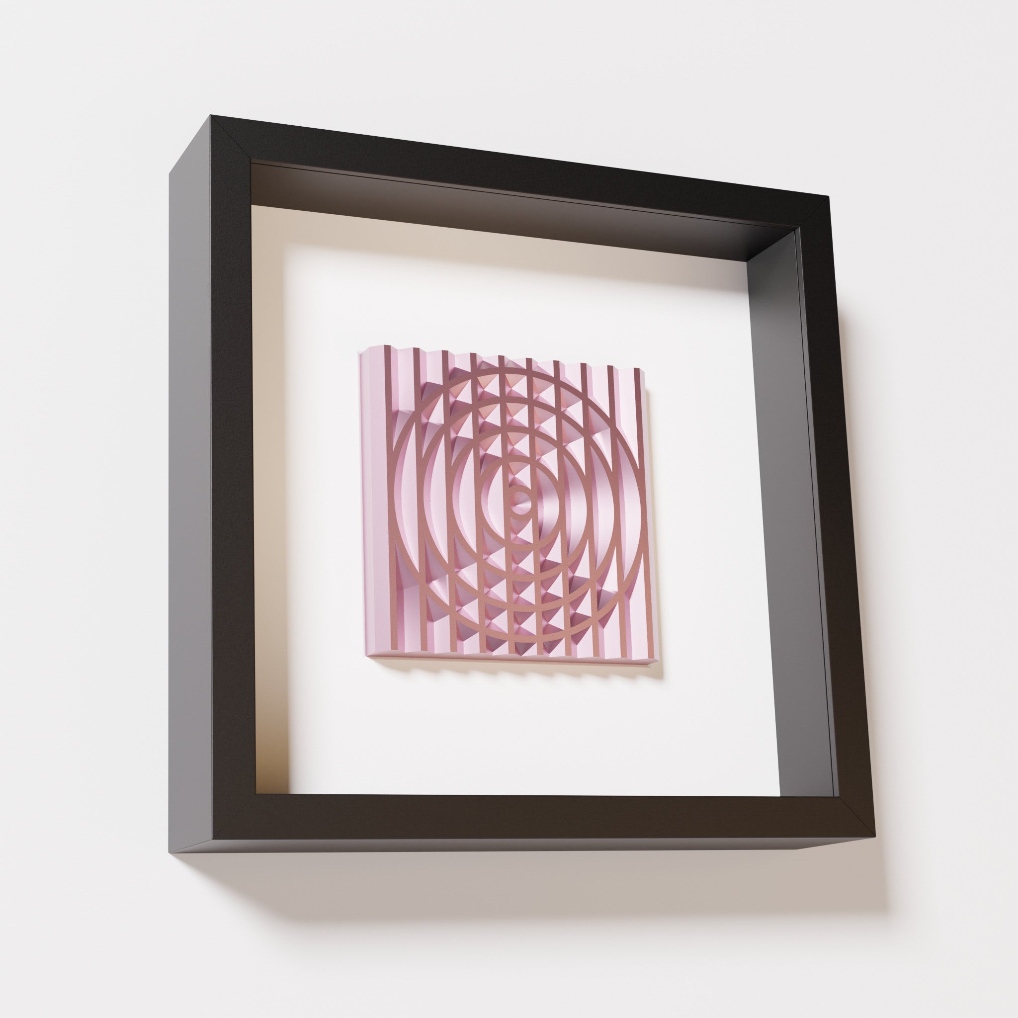 A close-up of a black shadowbox frame containing a metallic rose artwork featuring the elegant arcs and geometric grid of 'Rainbow III,' showcasing reflective pink highlights.