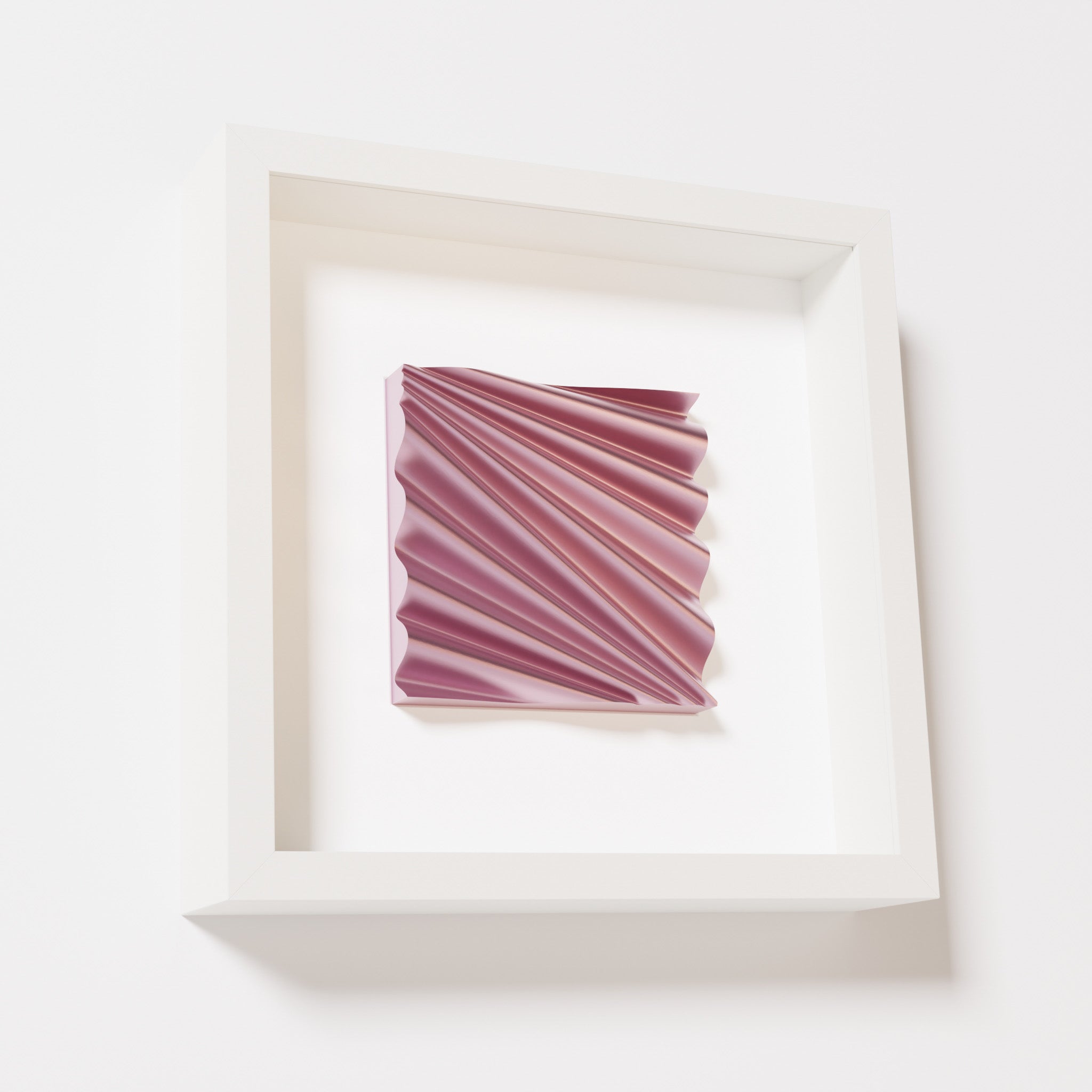 A close-up of a white shadowbox frame containing a metallic rose artwork featuring the rhythmic crests and troughs of 'Wave,' showcasing reflective pink highlights.